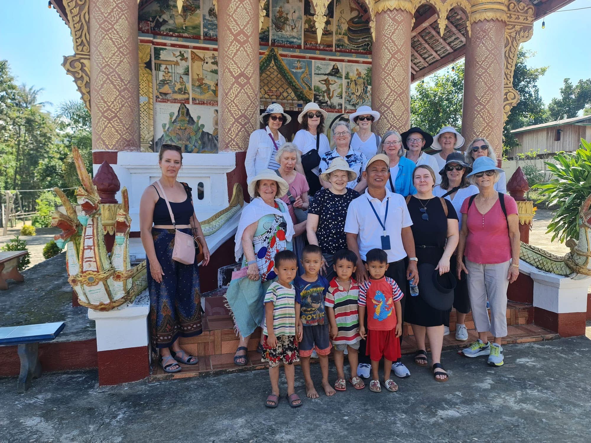 Group photo with tourists at historic site